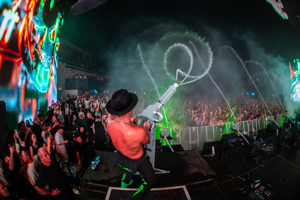 Timmy Trumpet firing water gun into the crowd at S2O Festival