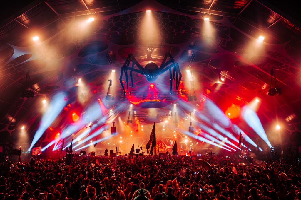 Wide shot of the Feeding Grounds and its iconic spider on the ceiling.