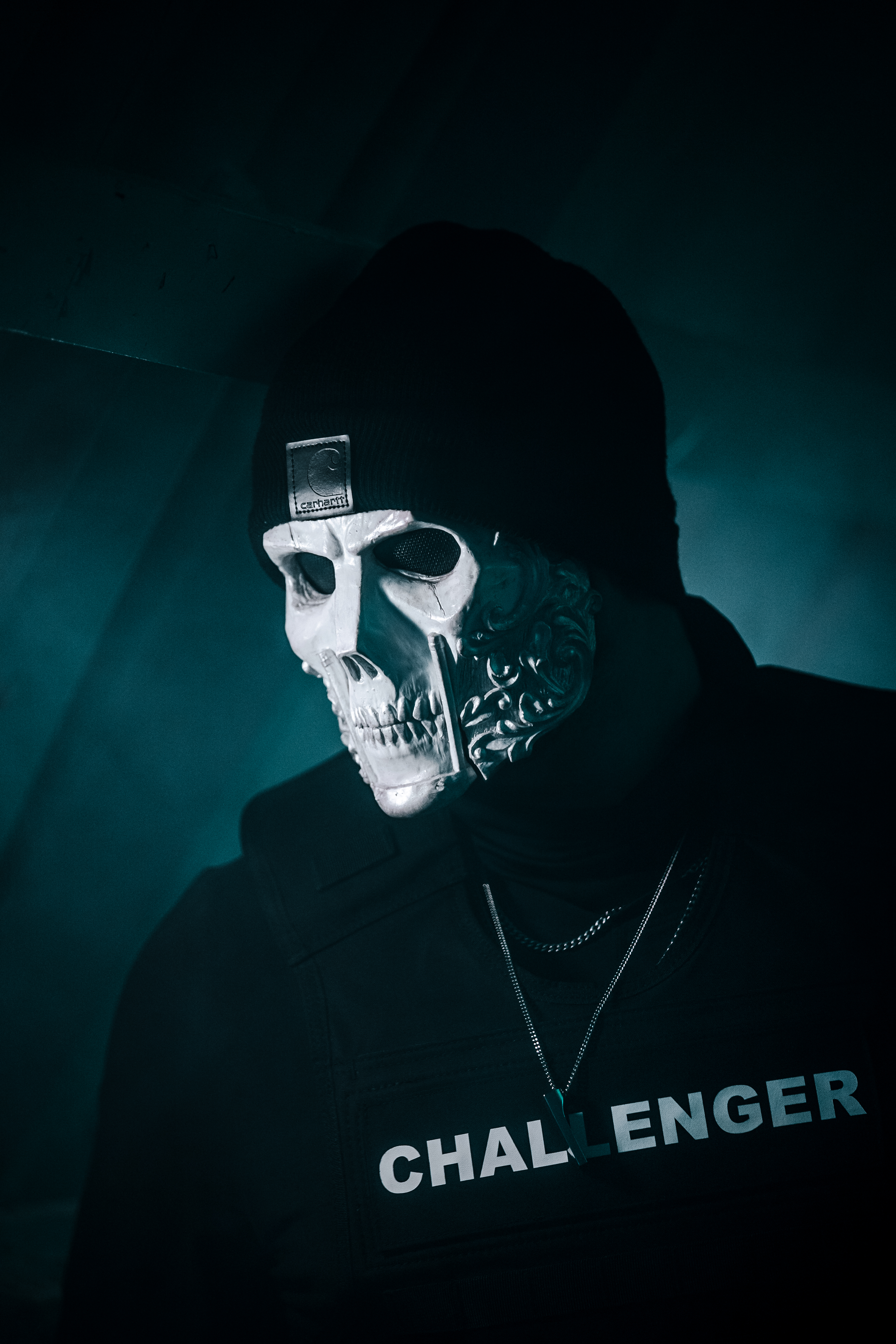 REAPER wearing his trademark mask and CHALLENGER Tshirt