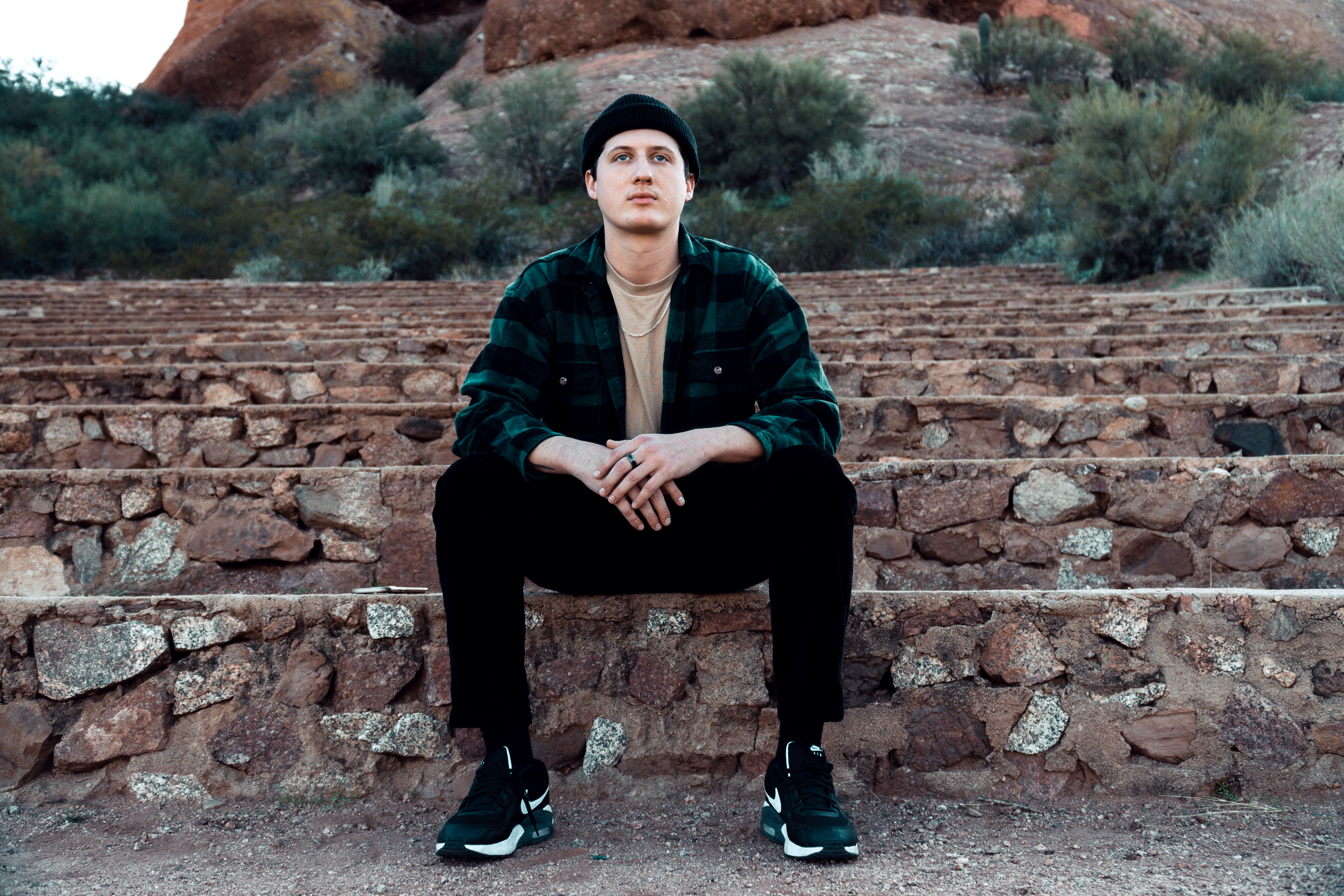 Ophion press shot sitting down